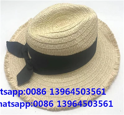 Schwarzer Fedora-Sonnenhut aus Stroh mit Schleife und Quaste