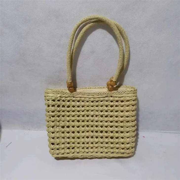 Handgemachte hohle Strohtasche in Beige für Damen