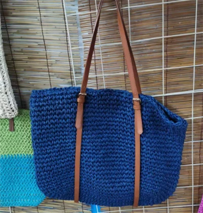 Blaue modische Strohtasche für Damen